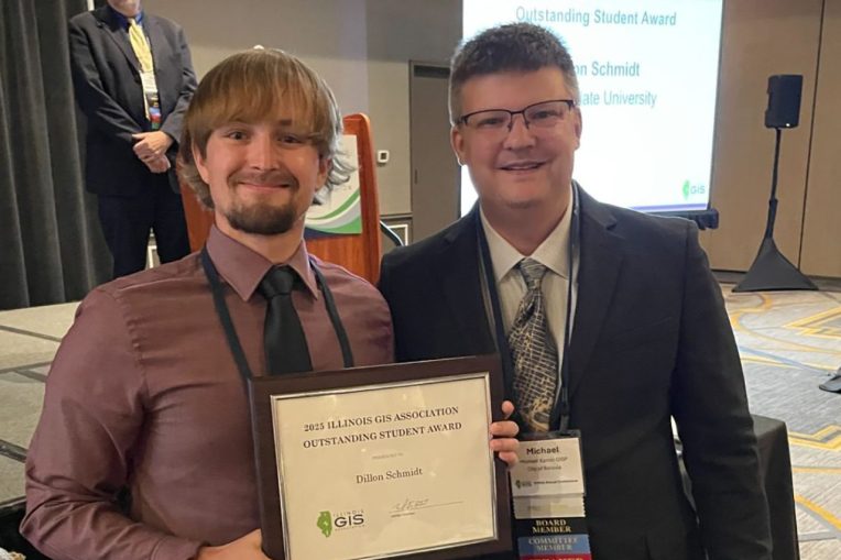 Dillon Schmidt holding plaque with Mike Kamin