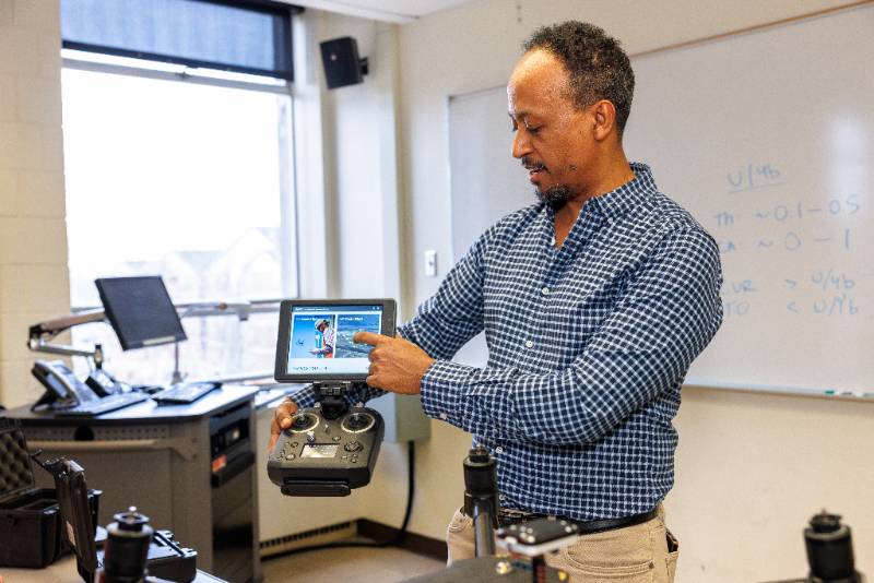 Professor demonstrating new technology