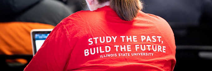 Student wearing a t-shirt with the words: study the past, build the future