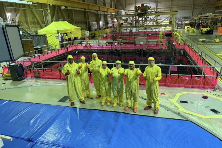 Group photo of members during their internship at a nuclear power plant.